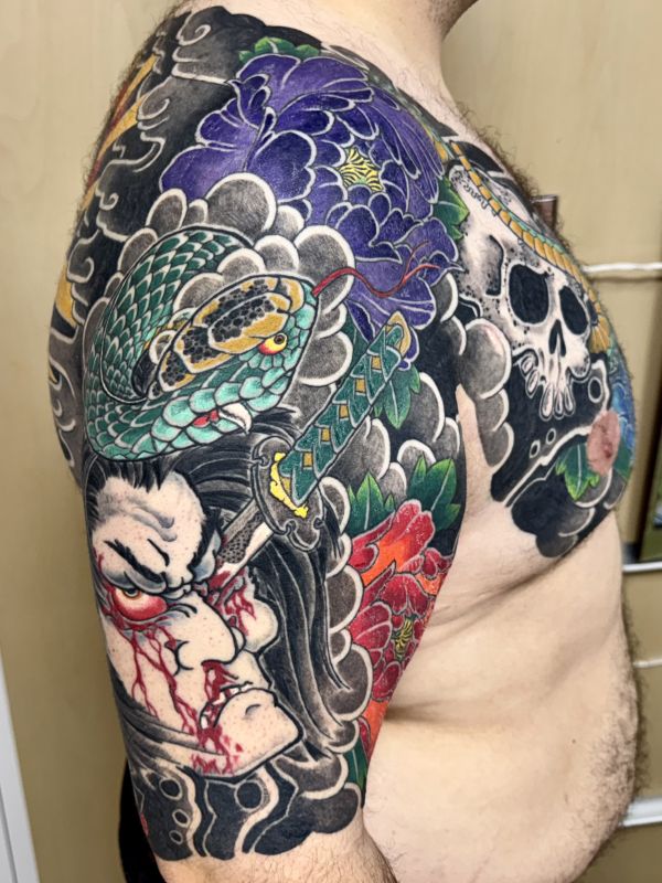 Namakubi and abandoned skull with snake